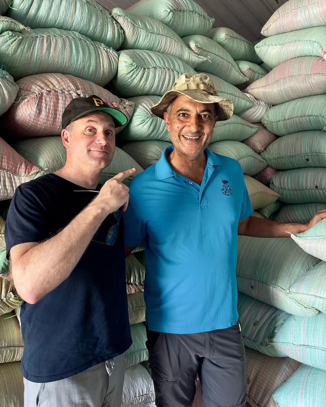 Stacked sacks of Robusta parchment on the estate, bound for Europe